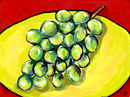 grapes-on-a-yellow-pla